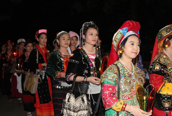 Ethnic Shan women in traditional dresses take part in an event to celebrate the 66th anniversary of Shan National Day at National Theater in Yangon, Myanmar.