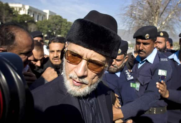 Pakistani cleric Tahir-ul-Qadri leaves the Supreme Court in Islamabad, Pakistan. Qadri filed a petition in the Supreme Court for the reconstitution of Election Commission of Pakistan. Government has suggested that election may be held in May 2013.