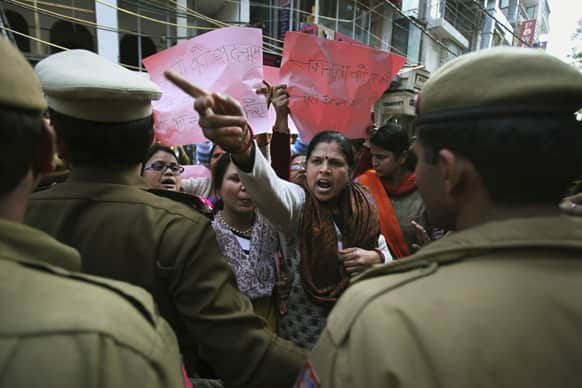 Activists of right wing Vishwa Hindu Parishad shout slogans against an art exhibition showcasing modern nude art in New Delhi.