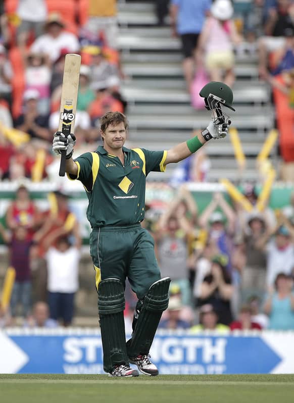 Australia`s Shane Watson celebrates hitting a century during their One Day International Cricket match against West Indies in Canberra.