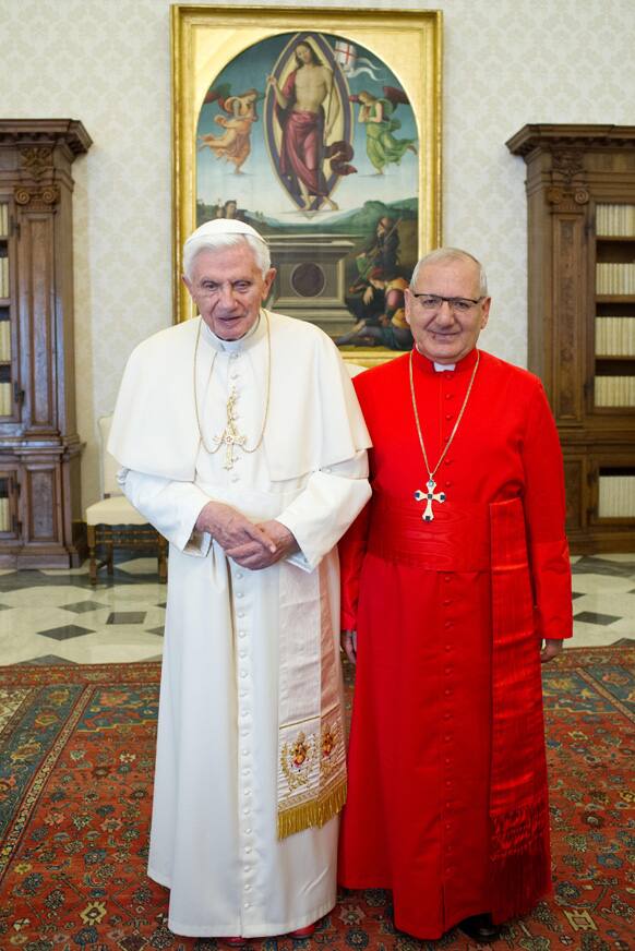 In this photo provided by the Vatican newspaper L`Osservatore Romano, Pope Benedict XVI meets the Chaldean Catholic Patriarch of Babylon and the Head of the Chaldean Catholic Church Louis Raphaël I Sako during a private audience at the Vatican.