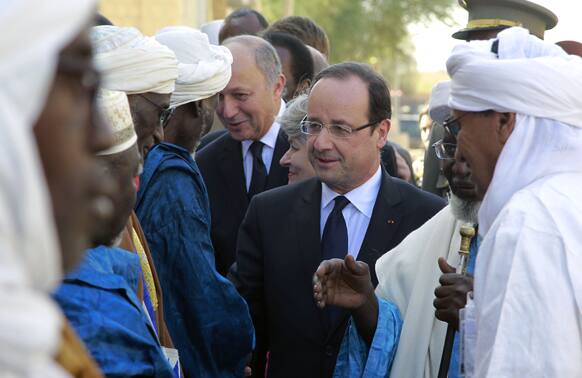French President Francois Hollande visits Timbuktu, Mali, making a triumphant stop six days after French forces parachuted in to liberate the desert city from the rule of al-Qaida-linked militants.