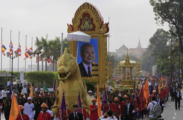 The portrait of late former King Norodom Sihanouk leads his royal funeral procession ahead of his, cremation, in Phnom Penh, Cambodia.