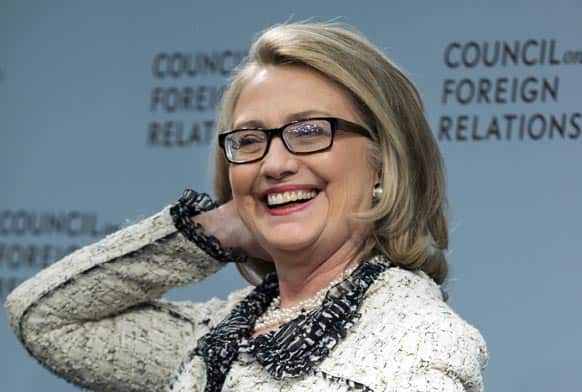 Secretary of State Hillary Rodham Clinton smiles before speaking on American leadership at the Council on Foreign Relations in Washington.