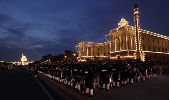 Members of Indian Naval band wait after full dress rehearsals of the Beating Retreat ceremony at Raisina hill which houses India`s most important ministries and presidential palace, in New Delhi.