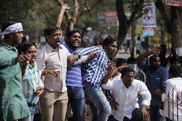 Students shout slogans during a protest demanding the creation of a separate Telangana state, in Hyderabad.