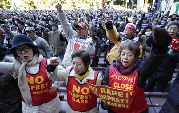Demonstrators shout slogans against the deployment of U.S. Marine Corps` MV-22 Osprey in Okinawa rally in Tokyo.