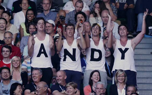 Supporters of Britain`s Andy Murray cheers him on in his match against Serbia`s Novak Djokovic during the men`s final at the Australian Open tennis championship in Melbourne.