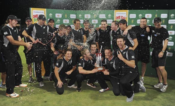 Team New Zealand celebrate after winning the series during their one-day international cricket match against South Africa in Potchefstroom, South Africa.