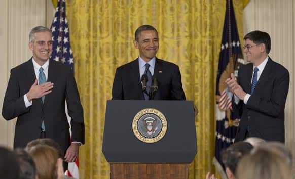 President Barack Obama, with current White House Chief of Staff Jack Lew, right, announces that he will name current Deputy National Security Adviser Denis McDonough,left, as his next chief of staff, in the East Room of the White House in Washington.