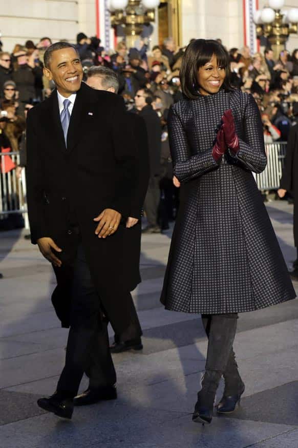 President Barack Obama and first lady Michelle Obama walk in the Inaugural Parade during the 57th Presidential Inauguration in Washington.