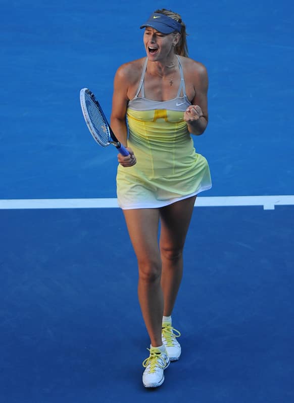 Russia`s Maria Sharapova celebrates after defeating compatriot Ekaterina Makarova in their quarterfinal match at the Australian Open tennis championship in Melbourne.