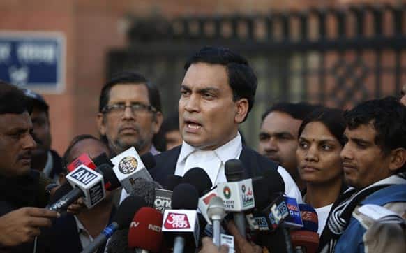A.P Singh, lawyer for one of the accused, speaks to journalists outside the Saket district court complex where the five men facing charges of rape and murder of a 23-year-old woman aboard a moving bus in the capital last month stand trial, in New Delhi.