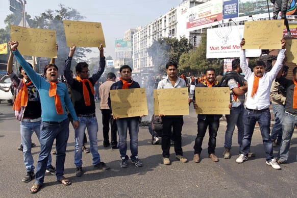 Supporters of Bharatiya Janata Party youth wing shout slogans during a protest against the central government’s move to partially decontrol hike in diesel price in Ahmadabad.