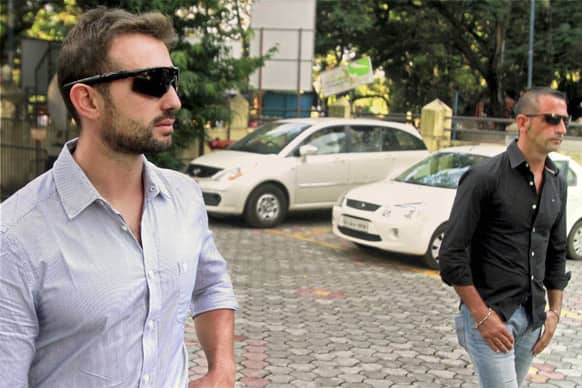 Italian marines Salvatore Girone and Massimiliano Latorre walk out of the police commissioner’s office in Kochi. India`s Supreme Court ruled Friday that two Italian marines accused of killing a pair of fishermen off the coast of India last year will be tried in a special court to be set up by the government.