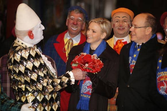 Prince Albert II of Monaco arrives with his wife Princess Charlene to attend the opening ceremony of the 37th Monte Carlo International Circus Festival in Monaco.