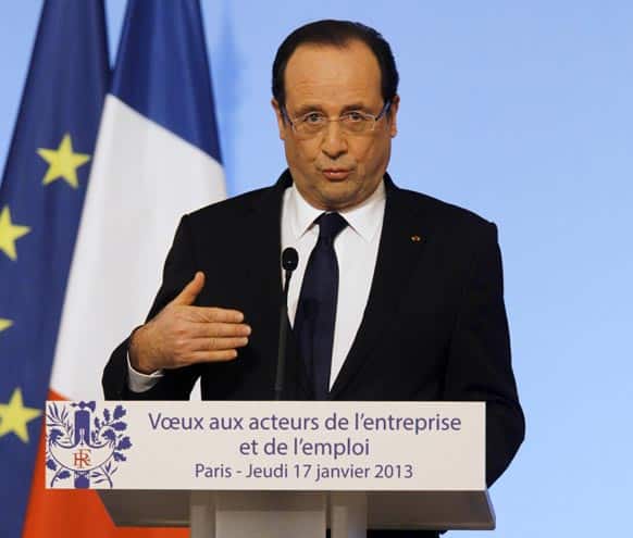 French President Francois Hollande delivers his speech, during the New Year wishes ceremony to union representatives and businessmen, at the Elysee Palace in Paris.