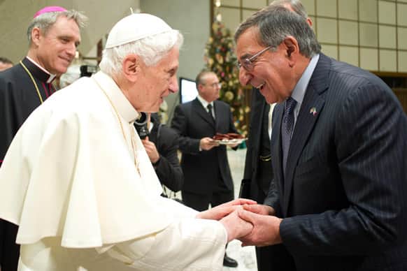 Pope Benedict XVI greets U.S. Defense Secretary Leon Panetta after the pontiff`s weekly general audience in Paul VI Hall at the Vatican.