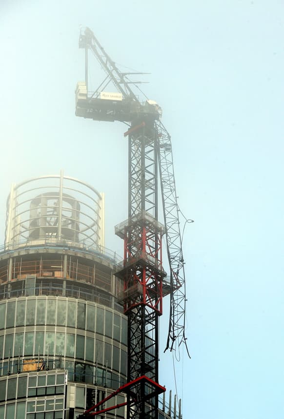 A general view of the damaged crane on top of St Georges Tower close to the scene where a helicopter crashed in central London.