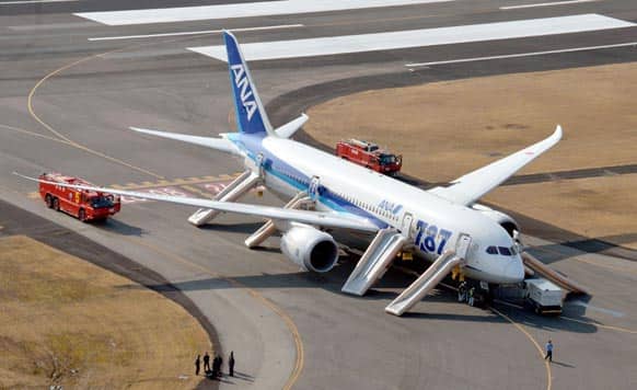 An All Nippon Airways flight sits at Takamatsu airport in Takamatsu, western Japan after it made an emergency landing.