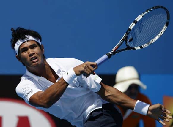 India`s Somdev Devvarman hits a forehand return to Poland`s Jerzy Janowicz during their second round match at the Australian Open tennis championship.