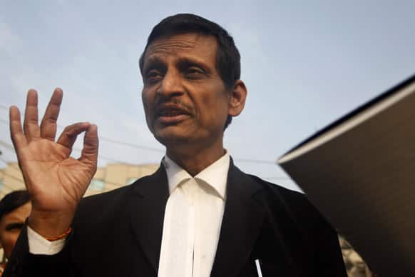 Manohar Lal Sharma, lawyer for one of the accused, speaks to the journalists outside the Saket district court complex where the accused in a gang rape are to be tried, in New Delhi.