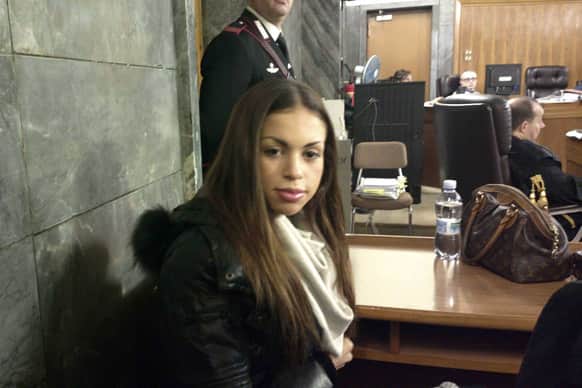 Karima el-Mahroug, the Moroccan woman at the center of ex-Premier Silvio Berlusconi`s sex-for-hire trial, sits in a court room prior to testifying as a witness for the first time, in Milan.