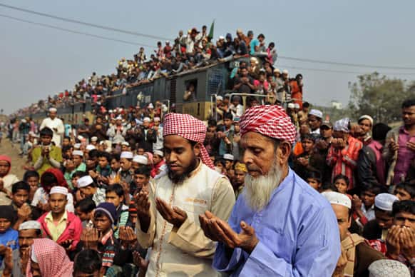 Bangladeshi Muslim devotees pray during the last day of the three-day Islamic Congregation at Tongi station, outskirts of Dhaka.