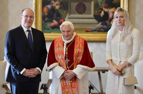 Pope Benedict XVI, Prince Albert II of Monaco, left, and his wife Princess Charlene pose for photographers during a private audience at Vatican.