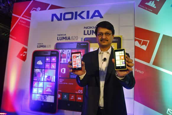 Viral Oza, Director Marketing Nokia India, introduces Nokia`s newest smartphone, the Lumia 920, equipped with Microsoft`s Windows Phone 8, in Bangalore.