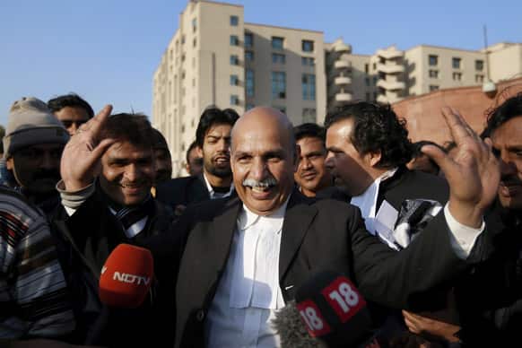 V.K. Anand, lawyer for one of the accused, gestures as he speaks to the journalists outside the Saket district court complex where the accused in a gang rape are to be tried, in New Delhi.