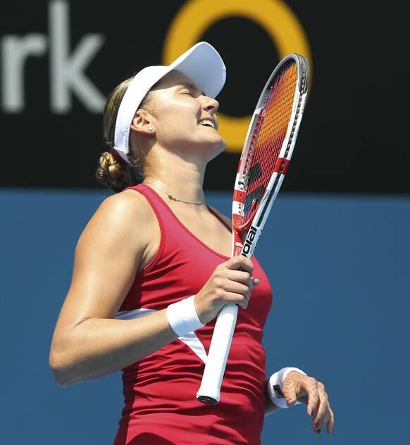 Russia`s Nadia Petrova reacts to a lost point in her match against Italy`s Roberta Vinci at the Sydney International Tennis tournament.
