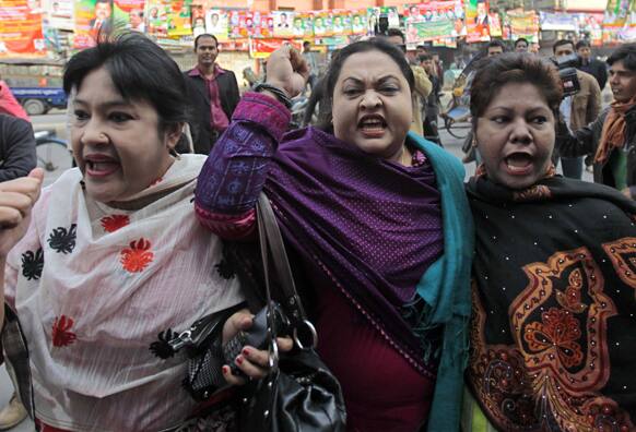 Women members of the country’s main opposition Bangladesh Nationalist Party (BNP) shout slogans during a strike in Dhaka, Bangladesh.