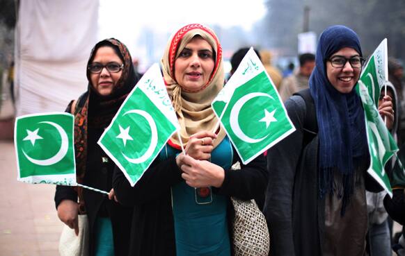 Fans of Pakistan cricket team react to camera outside the Feroz Shah Kotla ground, the venue of third and final one-day international cricket match between India and Pakistan in New Delhi.