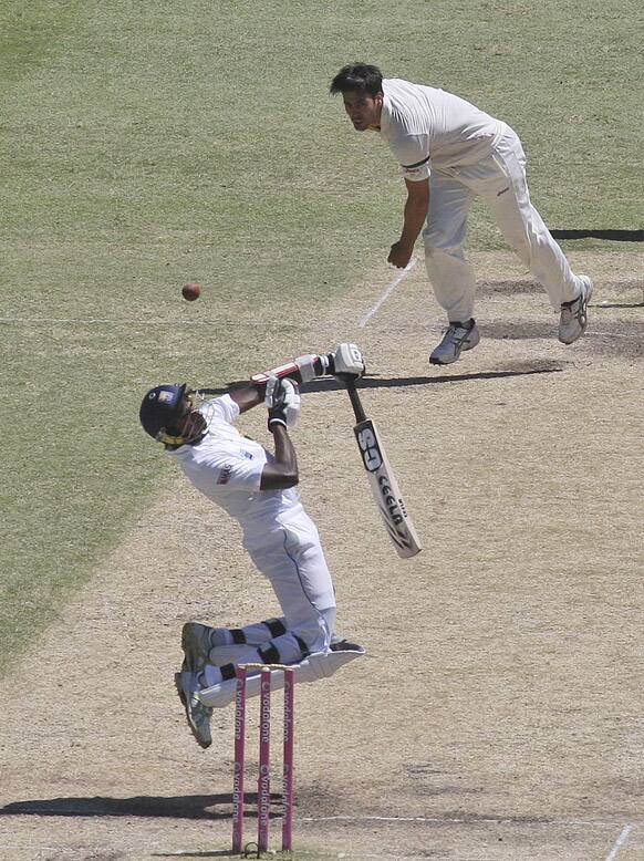 Sri Lanka`s Nuwan Pradeep is hit off a ball bowled by Australia`s Mitchell Johnson on day four of their third cricket test match in Sydney.