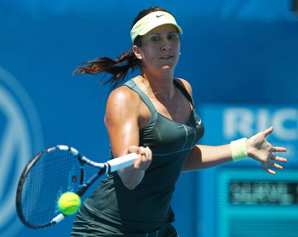 Sofia Arvidsson of Sweden plays a forehand to Galina Voskoboeva of Kazakhstan at the Sydney International tennis tournament.