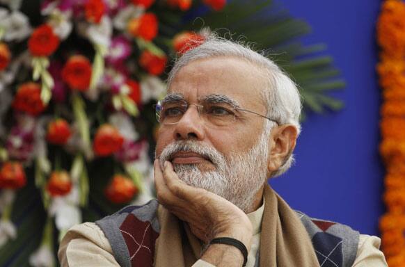 Gujarat state Chief Minister Narendra Modi meets the media after winning state elections held last month in Gandhinagar, India.