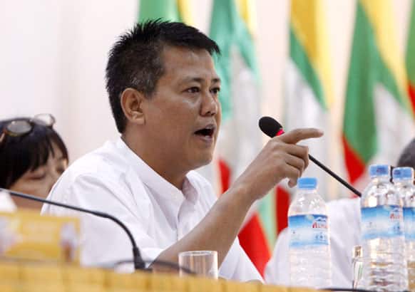 Than Khe, chairman of All Burma Student`s Democratic Front (ABSDF), talks to journalists during a press conference on their first trip to Myanmar at Peace Centre in Yangon, Myanmar.