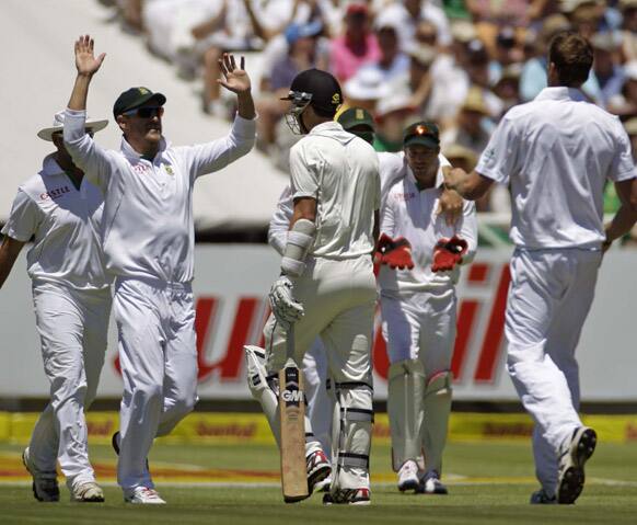South African team members react as they take the wicket of New Zealand`s Trent Boult during a five day test in Cape Town, South Africa.