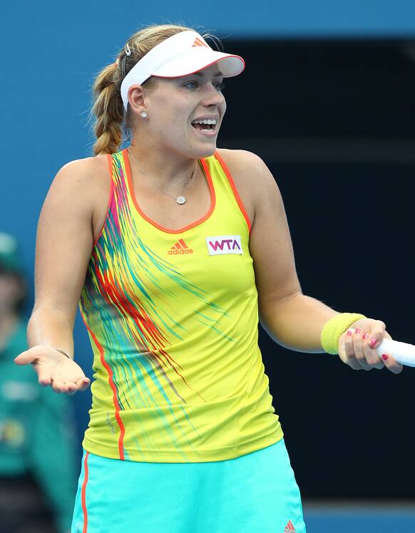 Angelique Kerber of Germany reacts to a line call in her 2nd round match against Monica Puig of Puerto Rico during the Brisbane International tennis tournament.