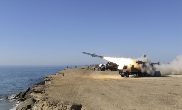 A Ghader missile is launched from the area near the Iranian port of Jask port on the shore of the Oman Sea during an Iranian navy drill.