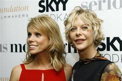 Cheryl Hines and Meg Ryan at the premiere of 'Serious Moonlight'. 