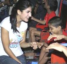 Katrina Kaif speaks with disabled children who came for a special screening of 'De Dana Dan'.