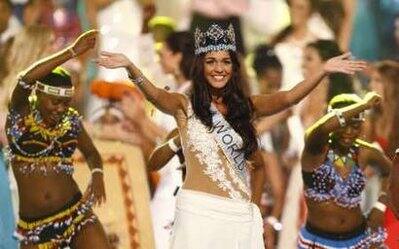 Miss Gibraltar Kaiane Aldorino waves after being crowned Miss World during the Miss World finals in Midrand, outside Johannesburg