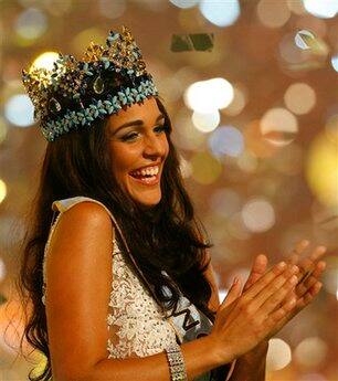 Gibraltar's Kaiane Aldorino reacts after winning the Miss World pageant in Johannesburg