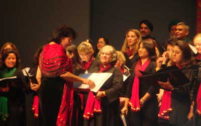 Capital City Minstrels in action guided by their energetic conductor.