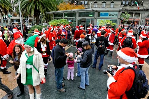 Santa's gather at Union Square during the Santacon pub crawl in downtown San Francisco