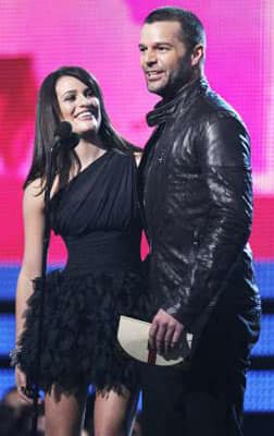 Presenters Lea Michelle and Ricky Martin (R) take part in the 52nd annual Grammy Awards in Los Angeles January 31, 2010