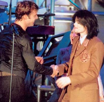 Ricky Martin with the late Michael Jackson at a performance.