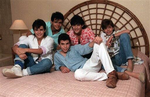 The pop group Menudo, from left, Sergio Gonzales,14, Robbi Rosa,15, Ray Acevado,14, Charlie Rivera,16, and Ricky Martin pose in New York.